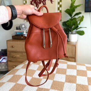 ZODENCE BURNT ORANGE BOHO MINI BACKPACK PURSE SILVER DETAILS